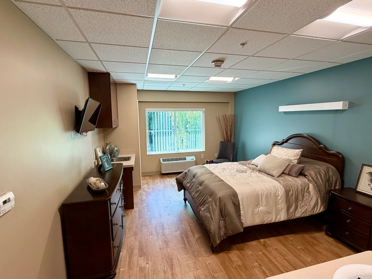 Private studio residence — bedroom and living space